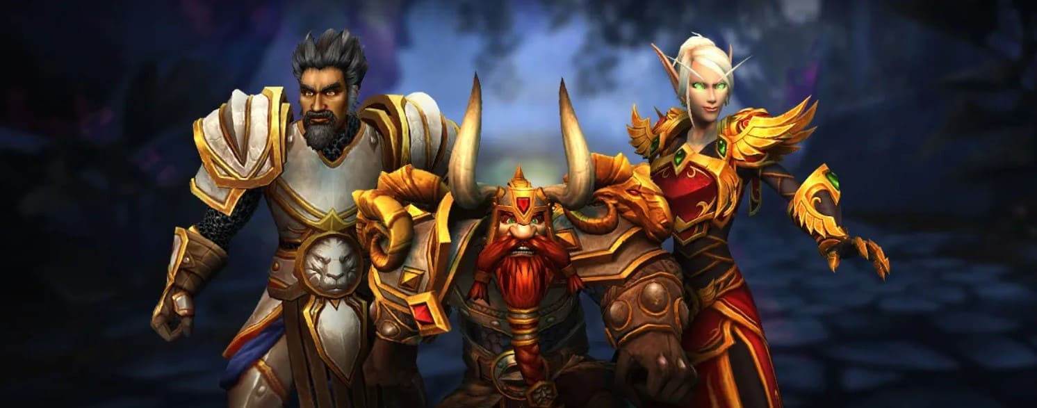 Three characters of World of Warcraft, a Human, Dwarf and Blood Elf in armor